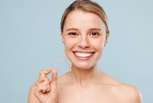 what causes crooked teeth aligners