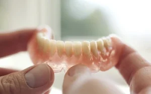 how to keep dentures from falling out wear