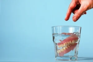 cleaning dentures in water cleaning dentures in water