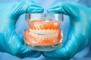 what are dentures made of complete