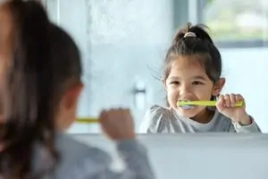 Baby First Tooth Symptoms brush